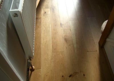 cherry wooden floor under radiator